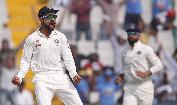 © Reuters. File photo of India's captain Kohli celebrating the dismissal of South Africa's du Plessis during the third day of their first cricket test match, in Mohali