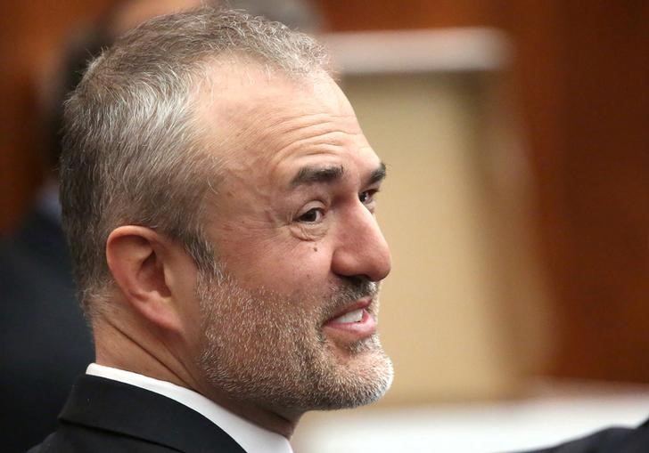 © Reuters. File picture of Nick Denton, founder of Gawker, talking with his legal team in St Petersburg, Florida