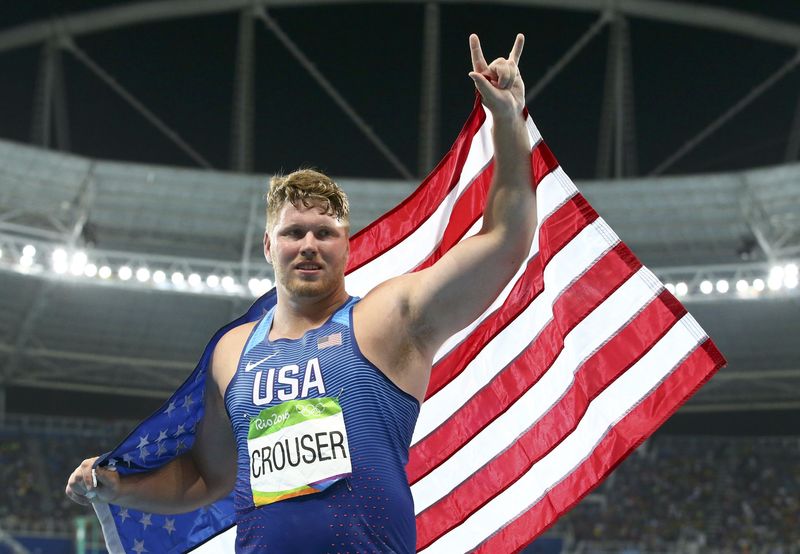 © Reuters. الأمريكي كروزر يفوز بذهبية دفع الجلة للرجال ويكسر الرقم الأولمبي