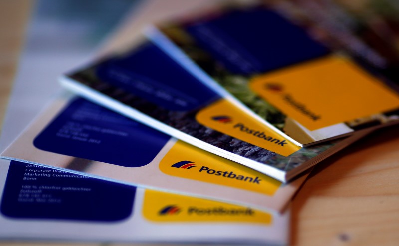 © Reuters. An illustration picture shows brochures of the Postbank AG  on a table in Munich