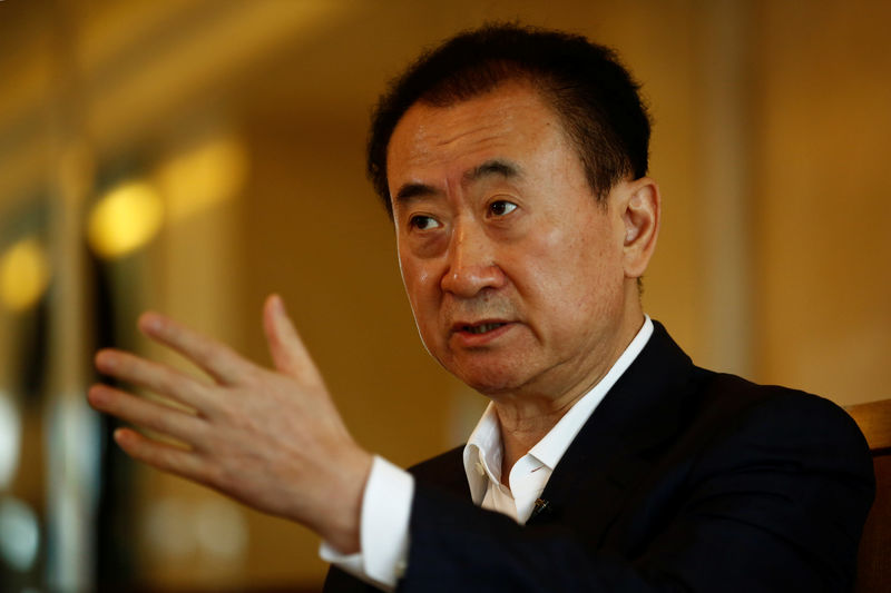 © Reuters. Wang Jianlin, chairman of the Wanda Group, speaks during an interview in Beijing