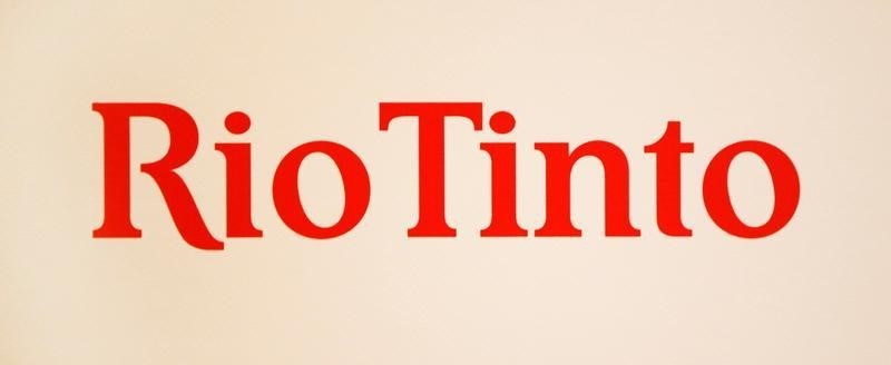 © Reuters. A Rio Tinto logo is displayed on the front of a wall panel during a news conference in Sydney