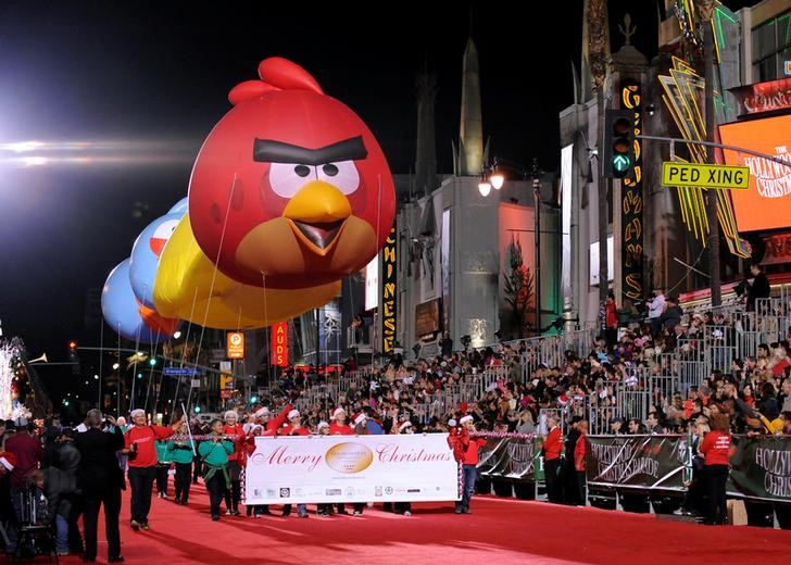 © Reuters. Angry Birds balloons are carried down Hollywood Boulevard during the 82nd Annual Hollywood Christmas Parade in Los Angeles