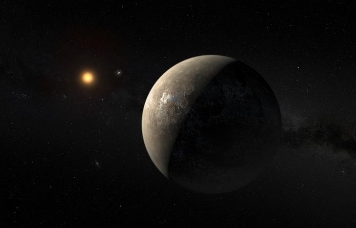 © Reuters. Imagem representando o planeta Proxima b orbitando a estrela próxima Proxima Centauri