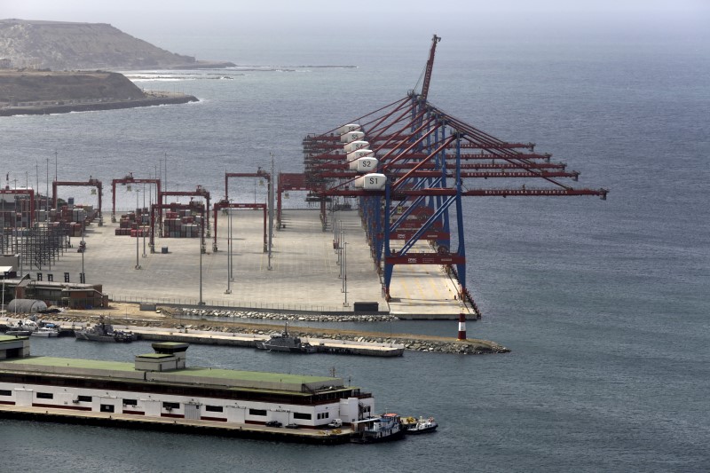 © Reuters. Cranes are seen in the port in La Guaira