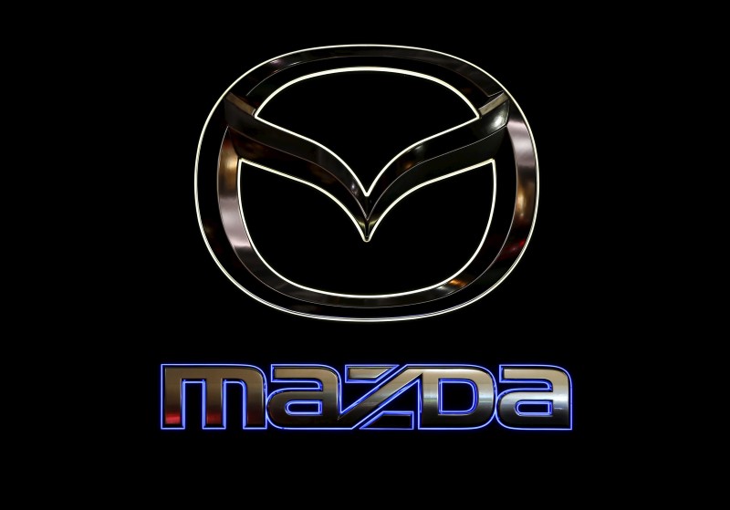 © Reuters. Logo of Mazda Motor Corp. is displayed at the 44th Tokyo Motor Show in Tokyo, Japan