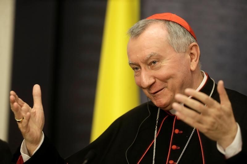 © Reuters. Cardinal Secretary of State of the Holy See Parolin gestures as he speaks during a news conference in Riga