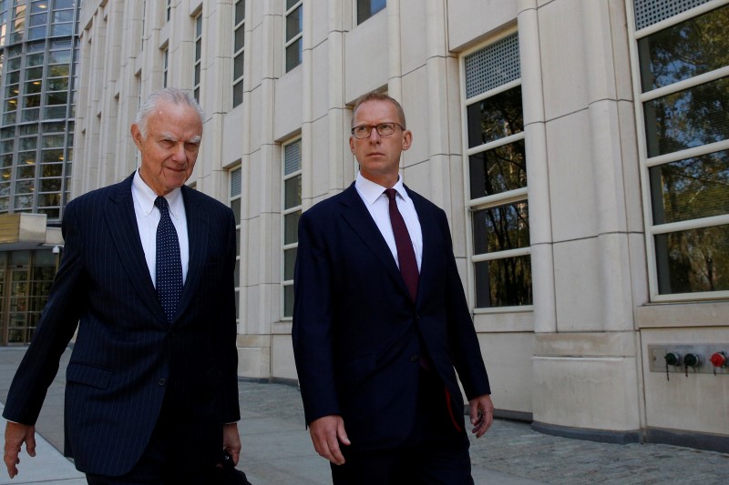 © Reuters. Mark Johnson exits following a hearing at the U.S. Federal Court in Brooklyn, New York