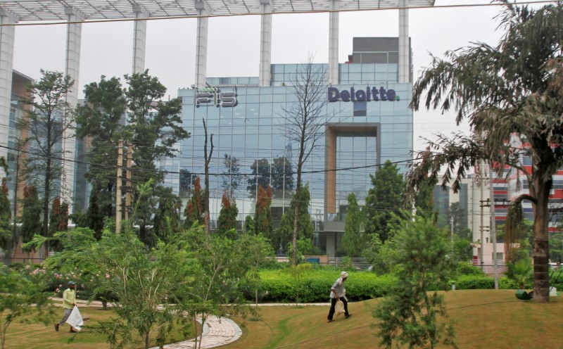 © Reuters. The Deloitte Company logo is seen on a commercial tower at Gurgaon