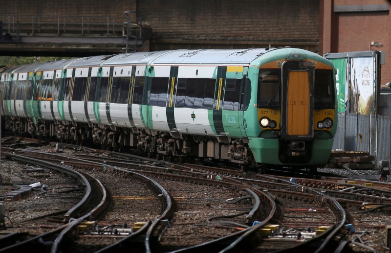 © Reuters. A Southern train arrives at Victoria Station in London