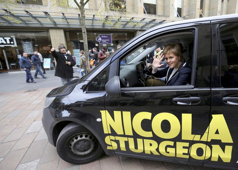 © Reuters. File photograph of SNP Leader and First Minister Nicola Sturgeon campaigning in Glasgow city centre on the eve of the Scottish Parliament election, Scotland