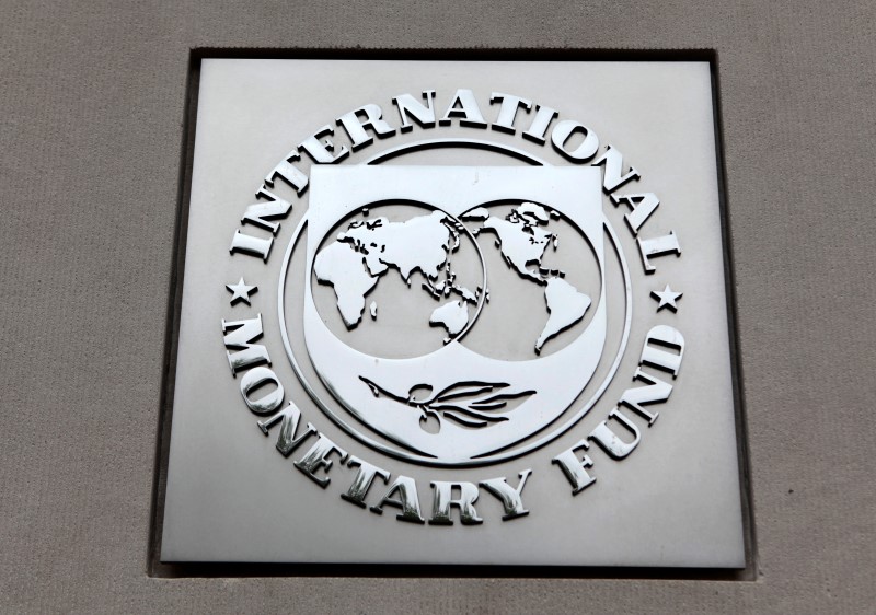 © Reuters. The International Monetary Fund (IMF) logo is seen at the IMF headquarters building during the 2013 Spring Meeting of the International Monetary Fund and World Bank in Washington