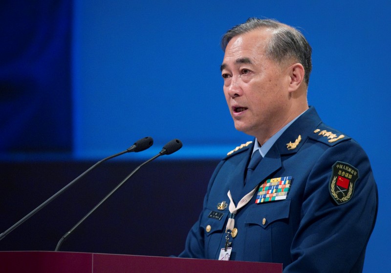 © Reuters. China's Deputy Chief of the General Staff of the PLA Ma speaks at the Shangri-La Dialogue Asia Security Summit in Singapore