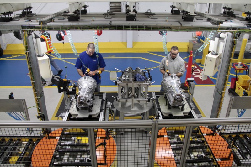 © Reuters. Employees work on the eight-speed transmission at the FCA US LLC Kokomo Transmission Plant in Kokomo Indiana
