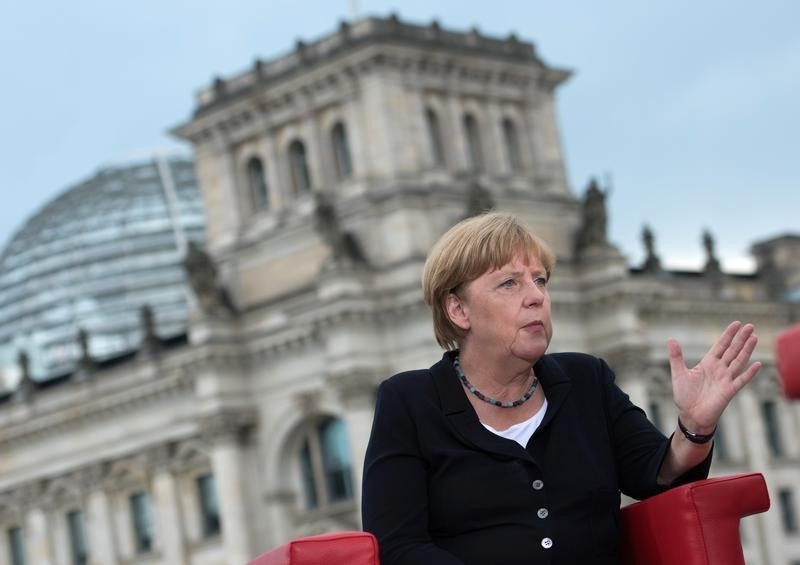© Reuters. German Chancellor Angela Merkel talks during ARD summer-interview in Berlin
