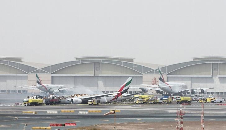 © Reuters. Emirates Airline flight is seen after it crash-landed at Dubai International Airport