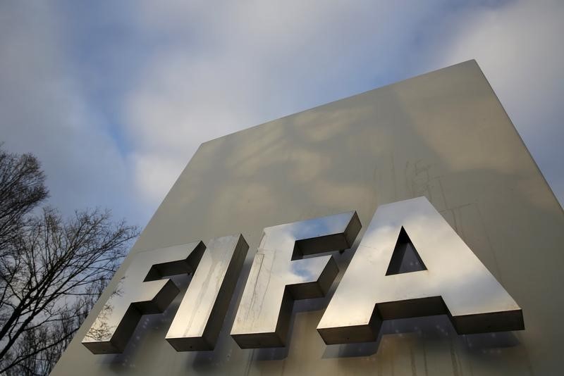 © Reuters. FIFA sign is seen outside the FIFA headquarters in Zurich