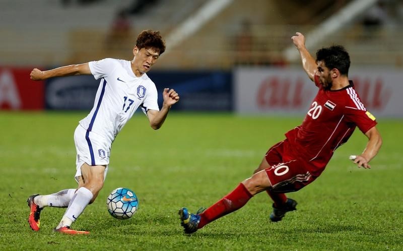© Reuters. سوريا تعرقل كوريا واستفاقة يابانية بتصفيات كأس العالم