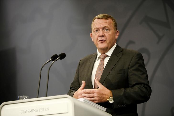 © Reuters. Danish Prime Minister Lars Lokke Rasmussen speaks during a press meeting in Copenhagen