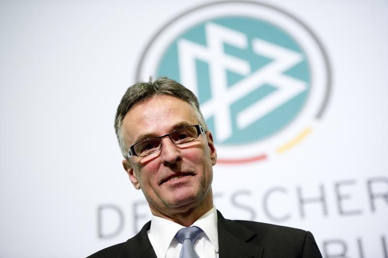 © Reuters. Sandrock new DFB secretary general poses for a picture after a general meeting in Frankfurt