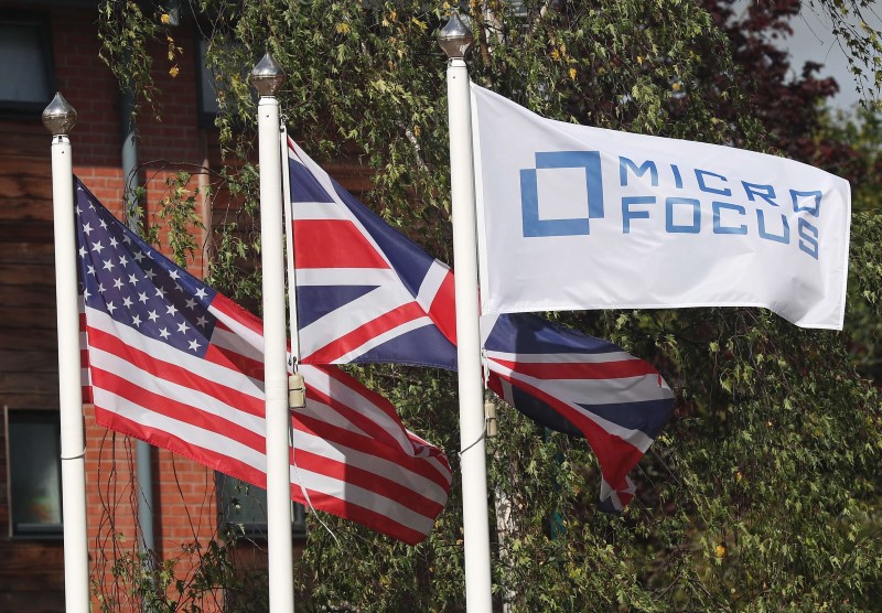 © Reuters. Flags fly outside the offices of Micro Focus in Newbury