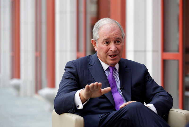 © Reuters. Blackstone CEO Stephen Schwarzman speaks during an interview at Schwarzman College of Tsinghua University in Beijing