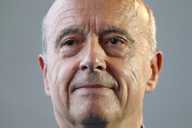 © Reuters. JUPPE DEVANCE SES CONCURRENTS SUR LA RÉPONSE A LA MENACE TERRORISTE SELON UN SONDAGE IFOP