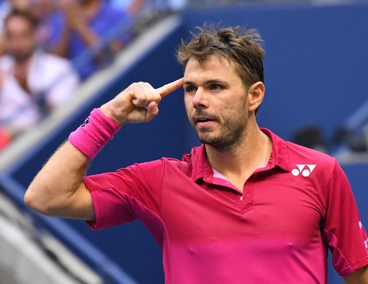 © Reuters. Wawrinka gana el Abierto de Estados Unidos tras derrotar a Djokovic