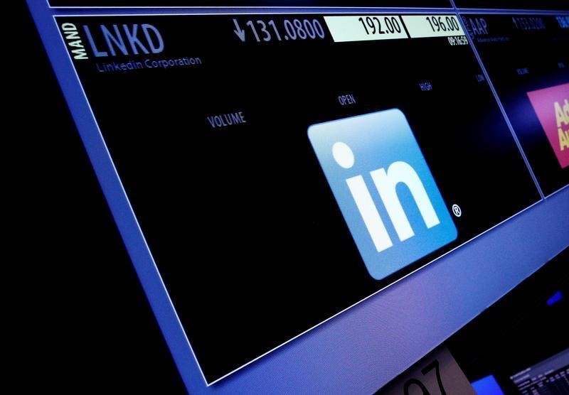 © Reuters. The ticker symbol and trading information for LinkedIn Corp. is displayed on a screen on the floor of the NYSE