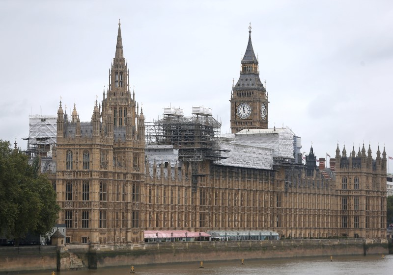 © Reuters. Scaffolding surrounds part of the Houses of Parliament, in Westminster in London