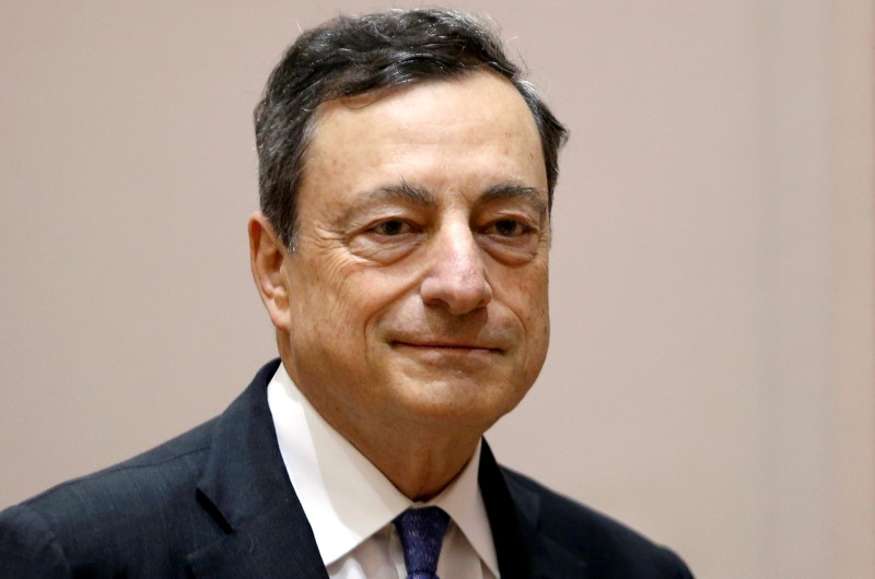 © Reuters. ECB President Draghi arrives to address the EU Parliament's Economic and Monetary Affairs Committee in Brussels