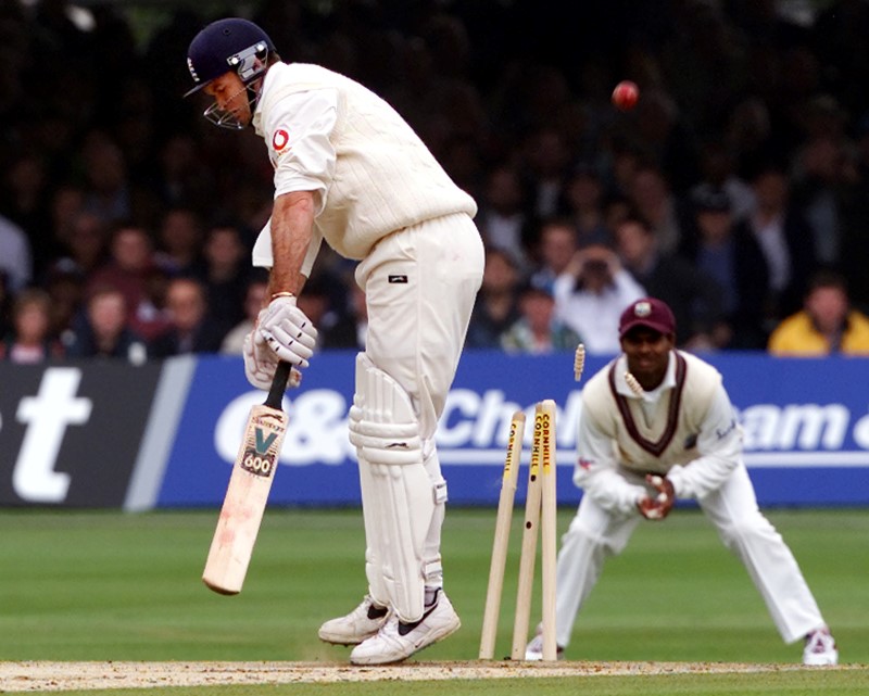 © Reuters. ENGLAND BATSMAN GRAEME HICK IS BOWLED BY WEST INDIAN CURTLEY AMBROSE.