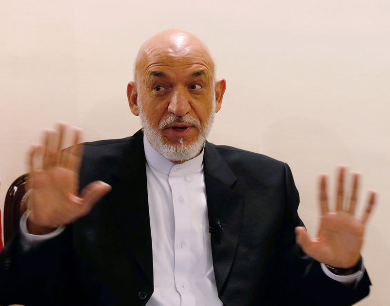 © Reuters. Former Afghan president Hamid Karzai speaks during an interview in Kabul