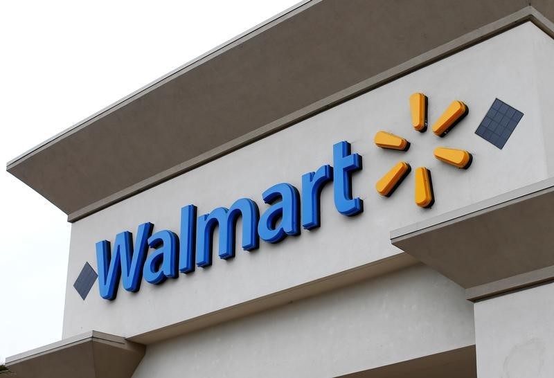 © Reuters. The logo of Down Jones Industrial Average stock market index listed company Walmart