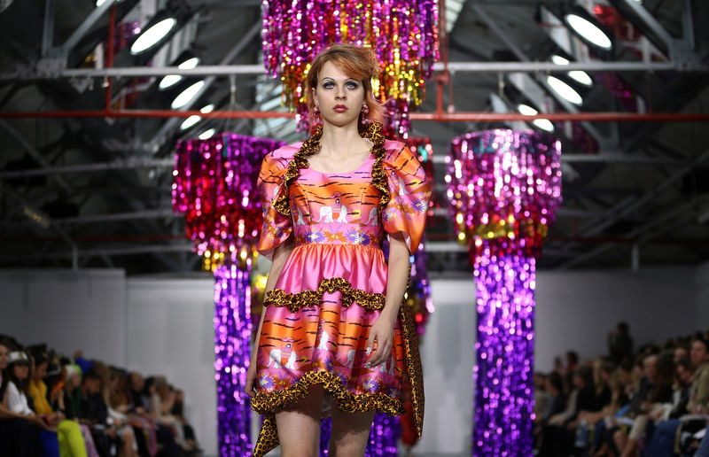 © Reuters. A model presents a creation at the Ryan Lo catwalk show during London Fashion Week Spring/Summer 2017 in London