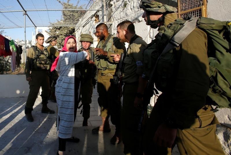 © Reuters. القوات الإسرائيلية تقول إنها قتلت ثلاثة مهاجمين في القدس والضفة