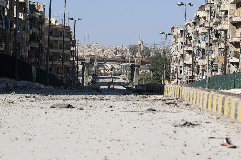 © Reuters. A damaged highway is pictured in the rebel-held al-Shaar neighbourhood of Aleppo