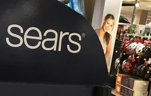 © Reuters. A Sears logo is seen inside a department store in Garden City, New York