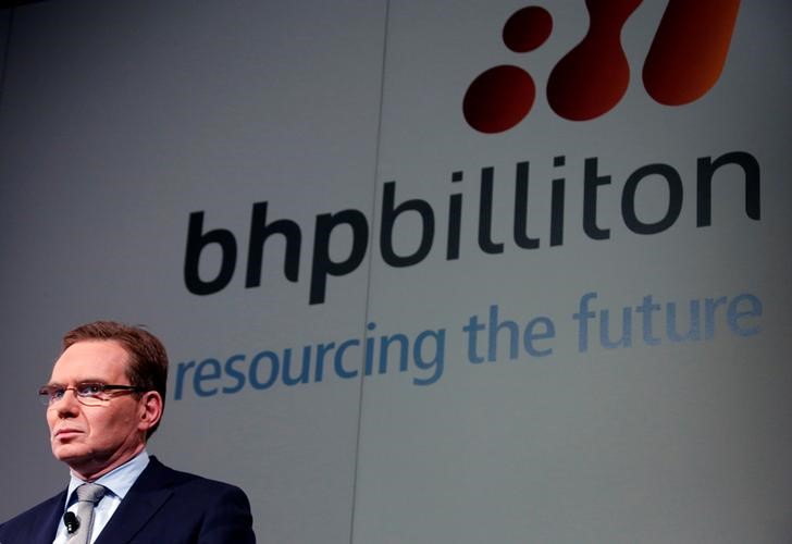 © Reuters. BHP Billiton Chief Executive Mackenzie prepares to discuss the company's annual results at a meeting in Sydney