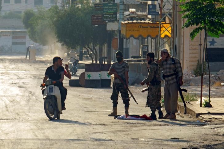 © Reuters. القوات الحكومية السورية تشن هجوما في حماة