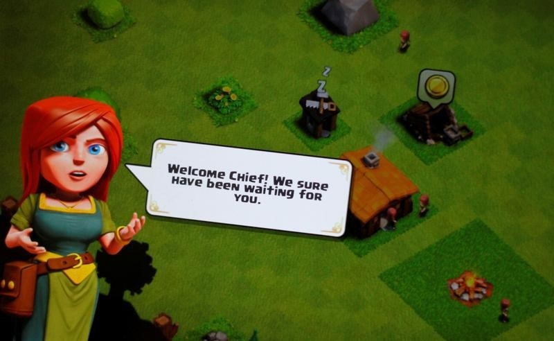 © Reuters. A "Clash of Clans" welcome screen is seen on a phone