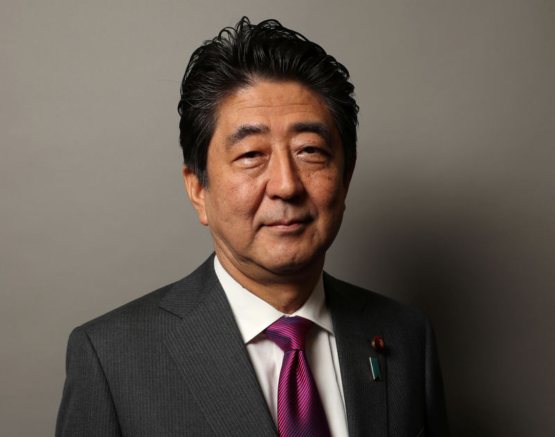 © Reuters. Japanese Prime Minister Shinzo Abe poses for a portrait in New York