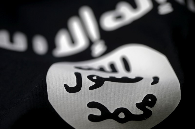 © Reuters. رئيس المخابرات البريطانية يعتبر تهديد تنظيم الدولة الإسلامية باقيا