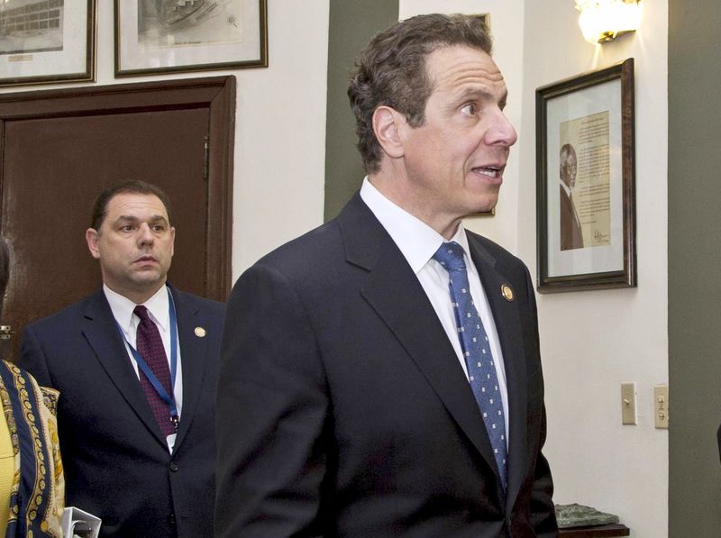 Ex-Cuomo aide, eight others charged in New York corruption case