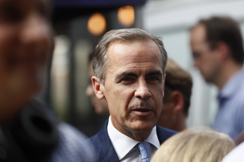 © Reuters. Bank of England governor Mark Carney arrives at Whitecross Street Market in London