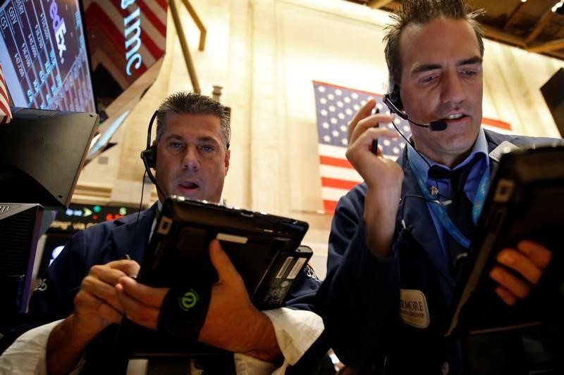 Wall Street falls as energy lags; shares post gains on week