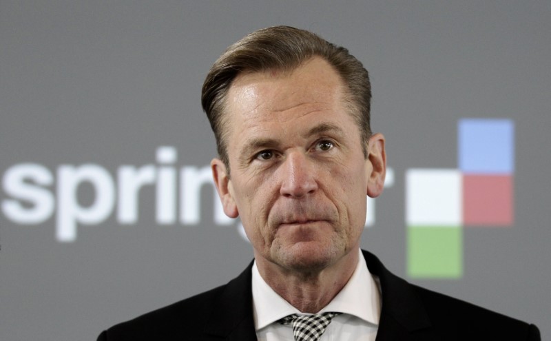 © Reuters. Axel Springer CEO Doepfner awaits start of annual news conference in Berlin