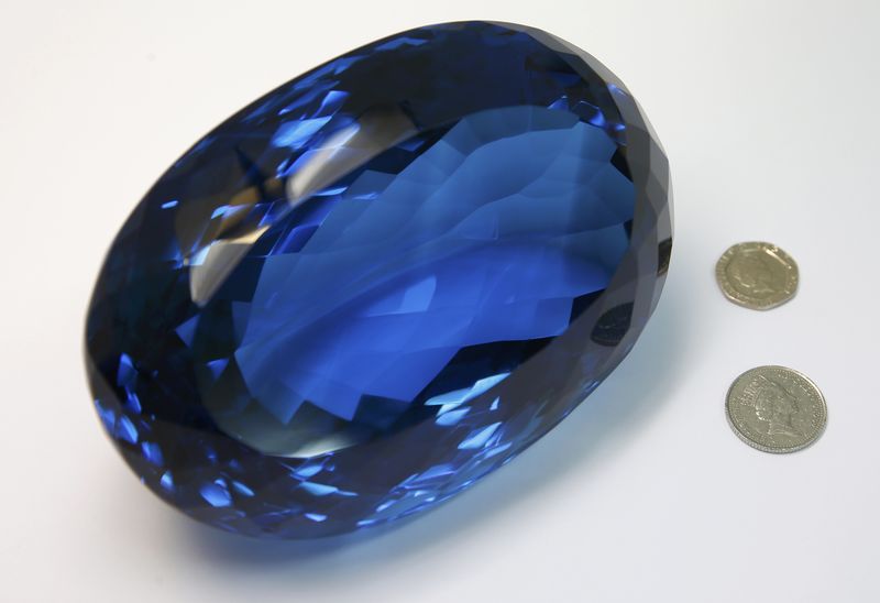 © Reuters. The largest known blue topaz stone, owned by philanthropist Maurice Ostro, is displayed to media at the Natural History Museum in London