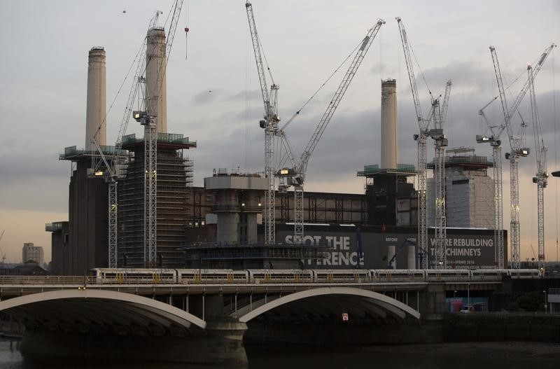 © Reuters. File photo of Battersea Power Station at dusk with one of its four iconic chimneys missing, in London