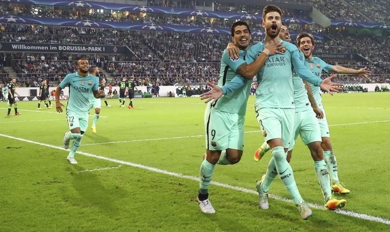 © Reuters. Atlético y Barcelona ganan sus encuentros de Liga de Campeones